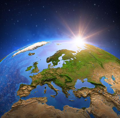 Surface of the Planet Earth viewed from a satellite, focused on Europe, sun rising on the horizon. Physical map of European countries. 3D illustration (Blender software) - Elements of this image furnished by NASA (https://eoimages.gsfc.nasa.gov/images/imagerecords/73000/73776/world.topo.bathy.200408.3x5400x2700.jpg).