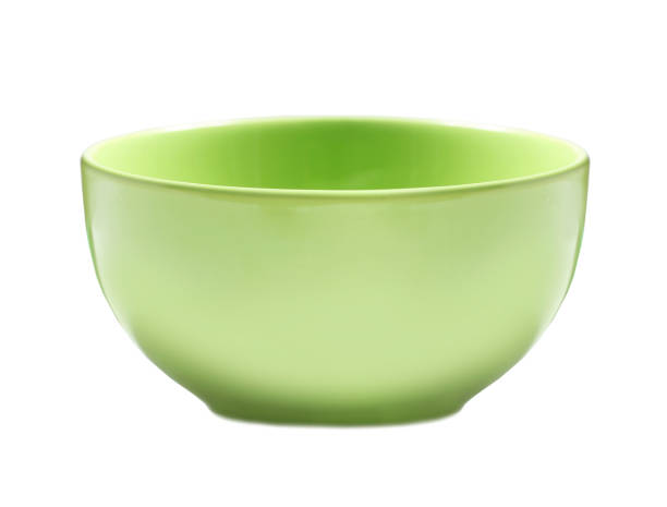 istock Green empty bowl isolated on white.Kitchen utensil. 1280362826