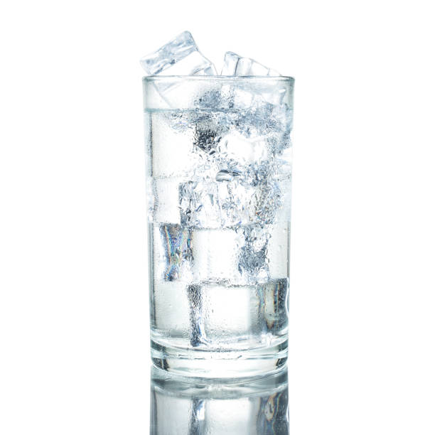 istock cold water with ice on glass isolated white background 1280362837