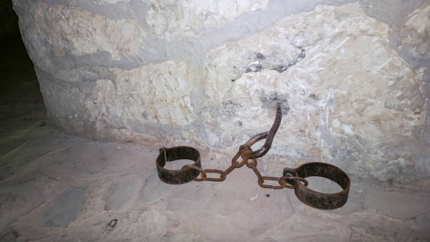 Iron shackles This image was taken with a mobile phone. medieval restraints stock pictures, royalty-free photos & images