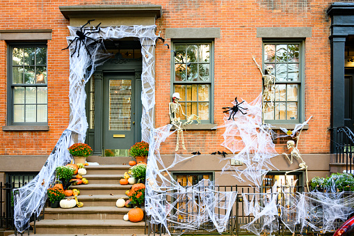 New York, New York, USA - October 14, 2020: A Greenwich Village Townhouse decorated for Halloween.