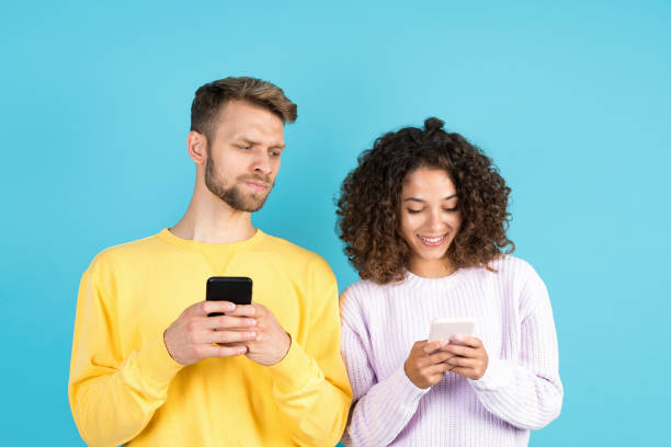 istock Two mixed race people on blue background 1280364277