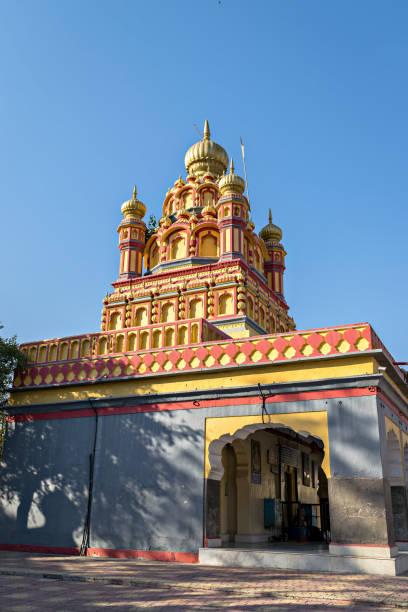istock oldest heritage structure in Pune - Parvati temple on a clear blue sky background on Parvati hill, Pune. 1280367518