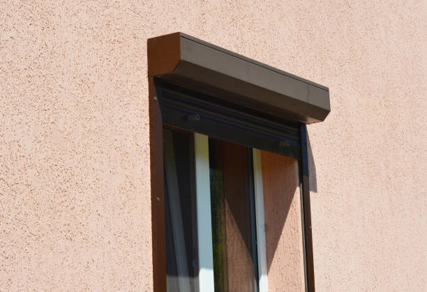 istock A close-up on an open brown exterior pvc motorized window roller shutter on a painted house. 1280367548