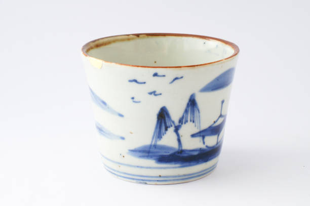 istock Kintsugi Antique broken Japanese cup repaired with gold. 1280370250
