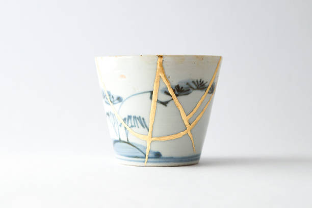 istock Antique broken Japanese soba cup repaired with gold kintsugi technique 1280370482
