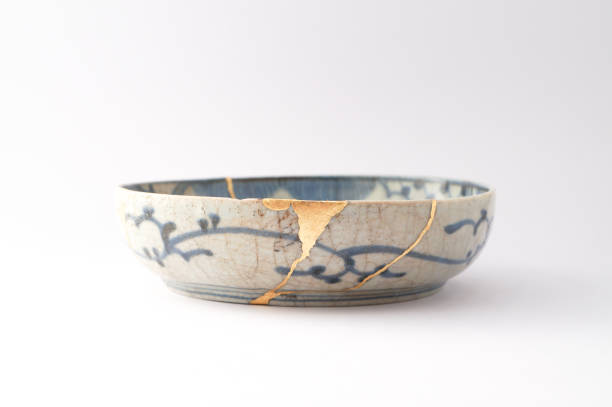 istock Antique broken Japanese plate repaired with gold kintsugi technique 1280370521
