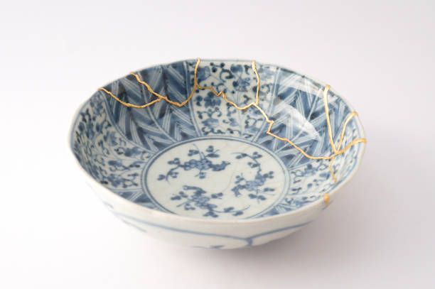 istock Antique broken Japanese plate repaired with gold kintsugi technique 1280370522