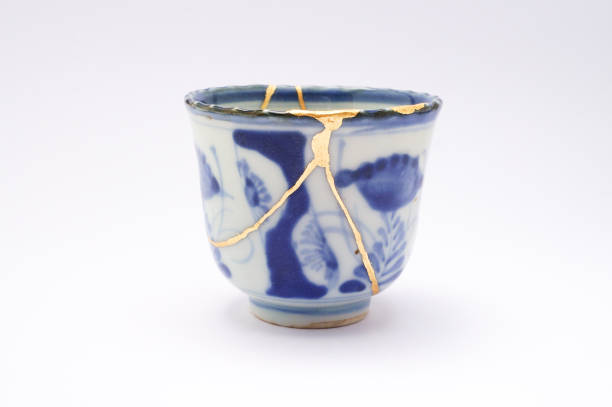 istock Antique broken Japanese soba cup repaired with gold kintsugi technique 1280370558