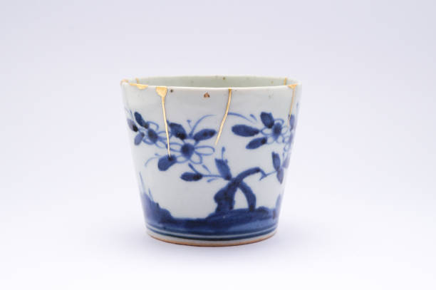 istock Antique broken Japanese soba cup repaired with gold kintsugi technique 1280370701