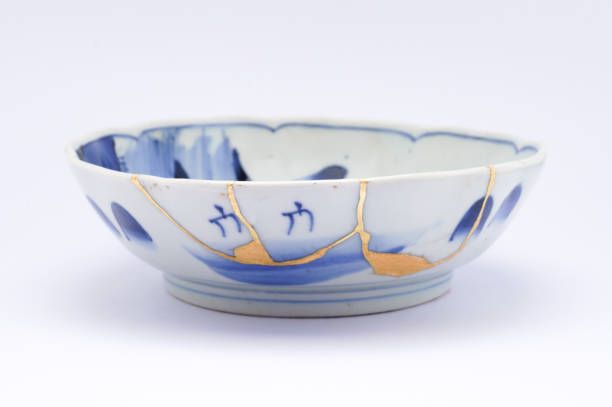 istock Antique broken Japanese plate repaired with gold kintsugi technique 1280370716