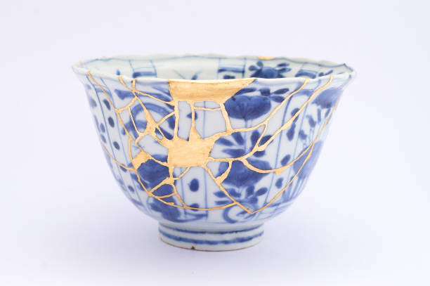 istock Antique broken Japanese bowl repaired with gold kintsugi technique 1280370731