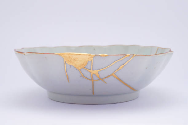istock Antique broken Japanese plate repaired with gold kintsugi technique 1280370746