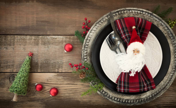 istock Holiday Christmas Dining Plate on an Old Wood Table 1280372326