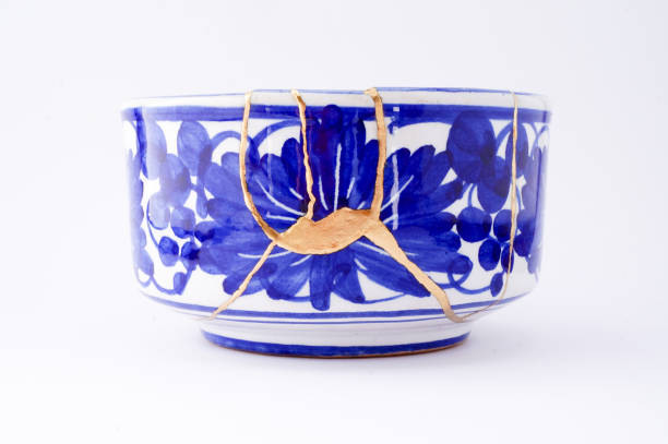 istock Antique broken Italian bowl repaired with gold kintsugi technique 1280373070