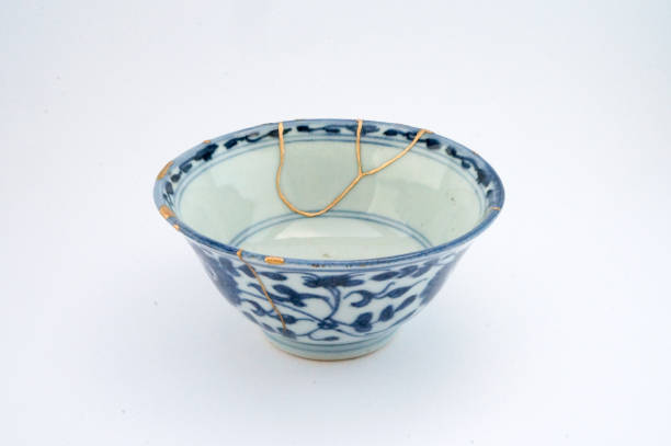 istock Antique broken Japanese bowl repaired with gold kintsugi technique 1280373072