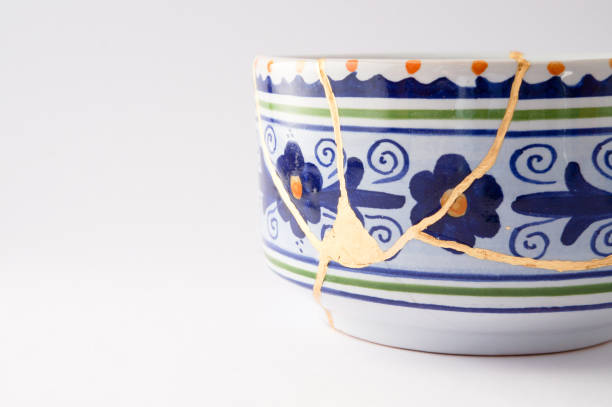 istock Antique broken Italian bowl repaired with gold kintsugi technique 1280373166