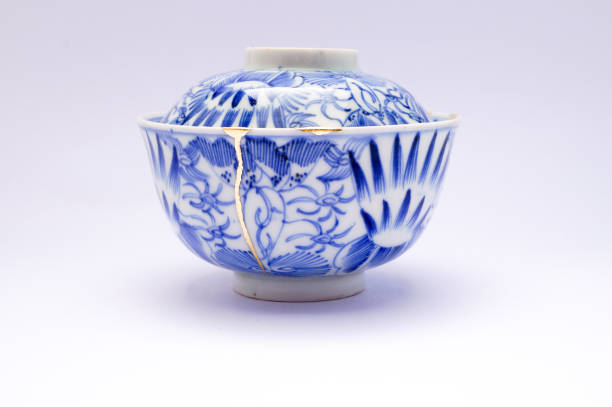 istock Antique broken Japanese bowl repaired with gold kintsugi technique 1280373170