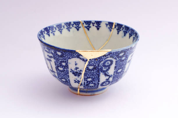 istock Antique broken Japanese bowl repaired with gold kintsugi technique 1280373179