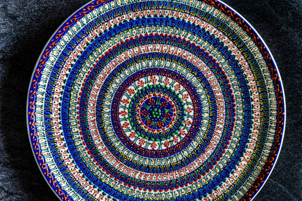 istock Handmade Ceramic Plates and Trays. Handcrafted with Traditional Ottoman Pattern on Dark Surface and Backround / Handicraft. 1280375151