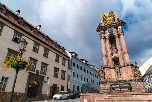 View of the Plague Column of the Holy Trinity, in the historical center of Banska Stiavnica This baroque style memorial was built to commemorate the end of the plague of 1710-11, which took the lives of half of the inhabitants of the Slovak city.