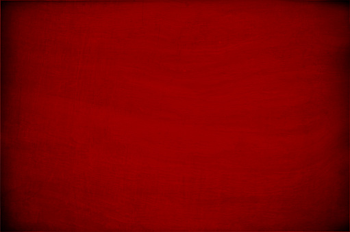 Horizontal bright deep blood red coloured wall or paper textured vector background . Paper texture. Cracked, crumpled look.It has a paint brush stroke wall effect. Ideal for wallpapers, greeting cards, gift wrapping paper sheets for festive celebrations occasion like Christmas, Diwali or New Year.