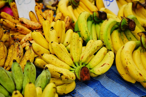 Many banana fruits on market in street food thailand