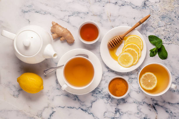 istock Green tea with lemon and honey, Immunity boosting and cold remedies 1280377594