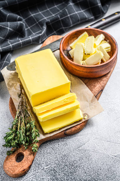 istock Farm Butter, organic dairy products. Gray background.Top view 1280377613