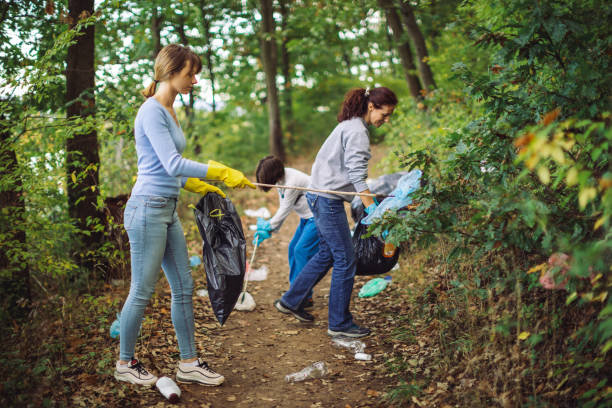 istock Collecting garbage in nature 1280380098