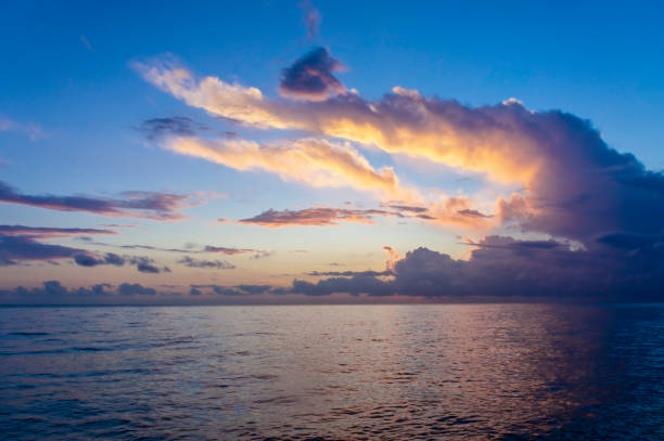 istock Landscape at sunset over the sea. Beautiful cloudy sky 1280381753