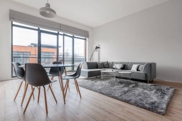 istock Stylish living room with dining table 1280382614