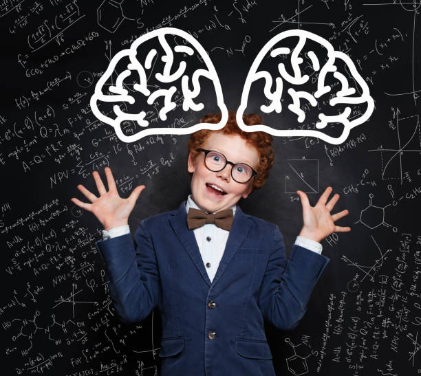 istock Funny child in school uniform on science background 1280382869