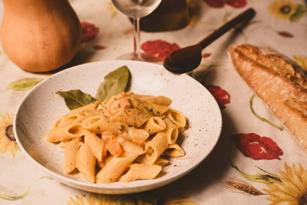istock butternut squash pasta with creamy , fresh pumpkin sauce on white plate and colorful table cloth. Traditional italian autumn pasta 1280385630