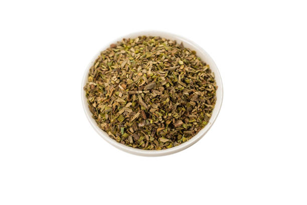 istock Oregano in a bowl isolated. 1280386009