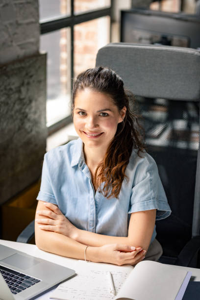 istock Beautiful Businesswoman Enjoying her Work 1280387552