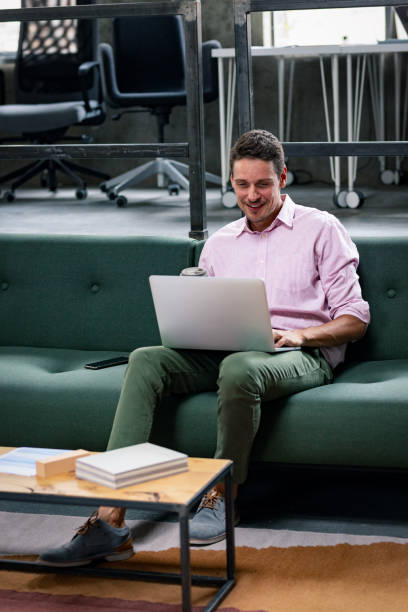 istock Modern Businessman Looking at His Laptop 1280388064