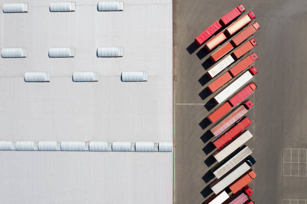 istock Aerial View of Trucks Loading at Logistic Center, Distribution Warehouse 1280388385