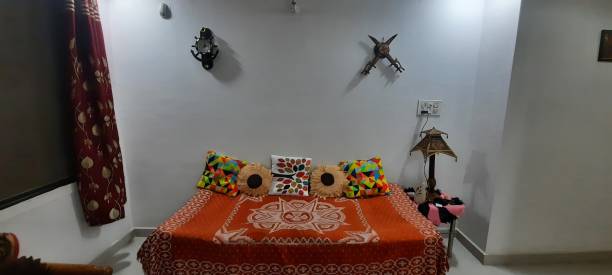 istock Wooden bed set with decorated wall table lamp and curtains 1280388500