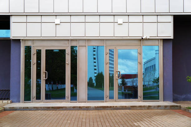 istock Gass doors of entrance in modern building. 1280389664