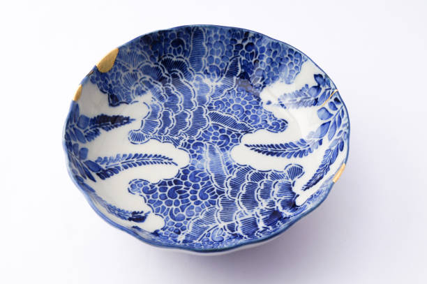 istock Antique broken Japanese blue bowl repaired with gold kintsugi technique 1280390223