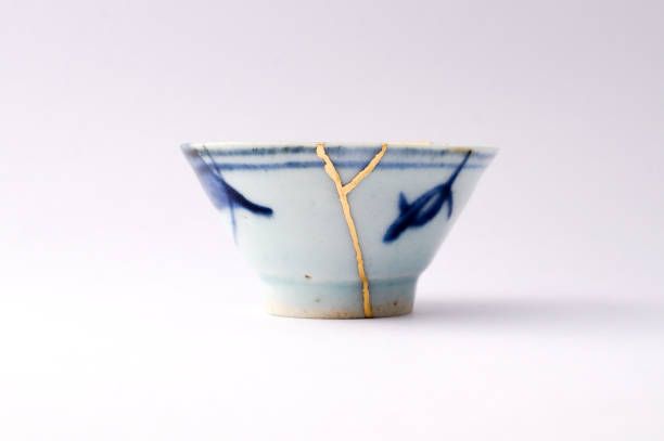 istock Antique broken Japanese blue cup repaired with gold kintsugi technique 1280390233