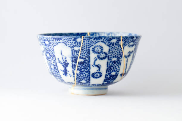 istock Antique broken Japanese blue bowl repaired with gold kintsugi technique 1280390244
