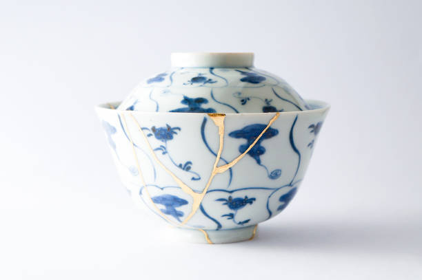 istock Antique broken Japanese blue bowl repaired with gold kintsugi technique 1280390247