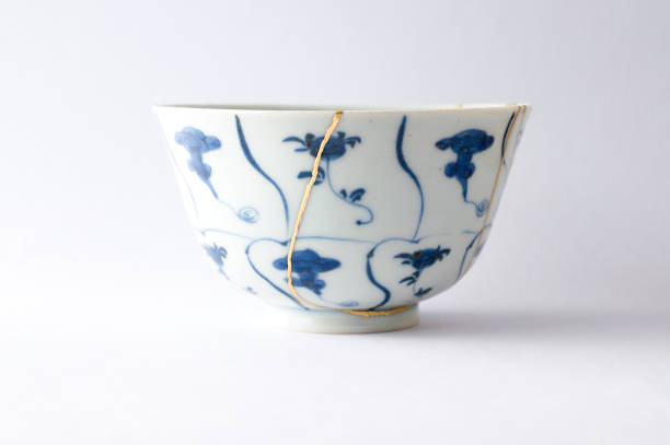 istock Antique broken Japanese blue bowl repaired with gold kintsugi technique 1280390248
