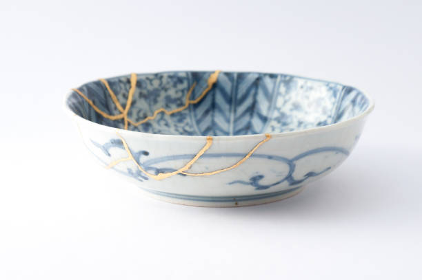 istock Antique broken Japanese blue bowl repaired with gold kintsugi technique 1280390261