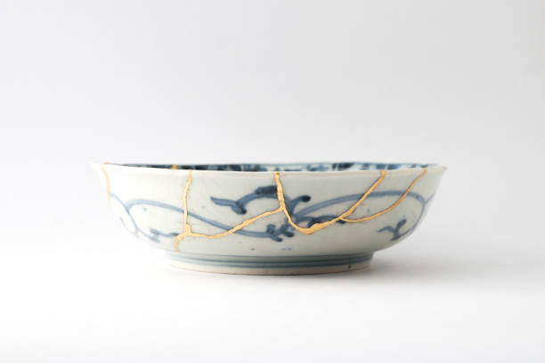 istock Antique broken Japanese blue bowl repaired with gold kintsugi technique 1280390269