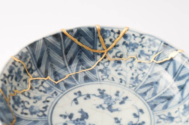istock Antique broken Japanese blue bowl repaired with gold kintsugi technique 1280390277
