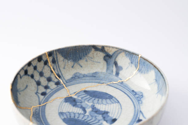 istock Antique broken Japanese blue bowl repaired with gold kintsugi technique 1280390284