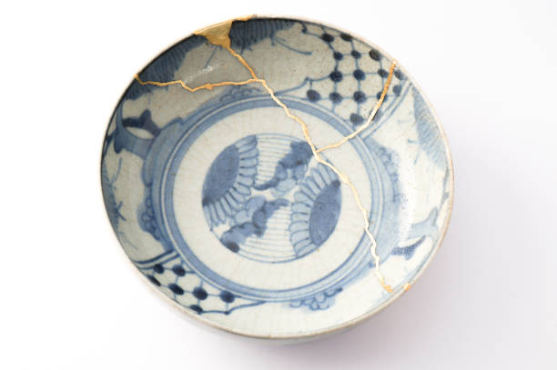 istock Antique broken Japanese blue bowl repaired with gold kintsugi technique 1280390294